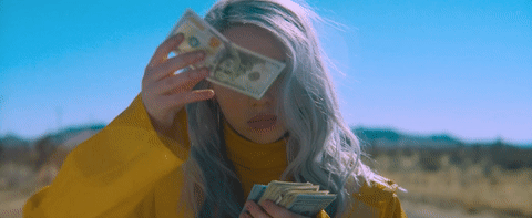 Billie Eilish throwing money