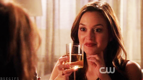 Blair drinking champagne